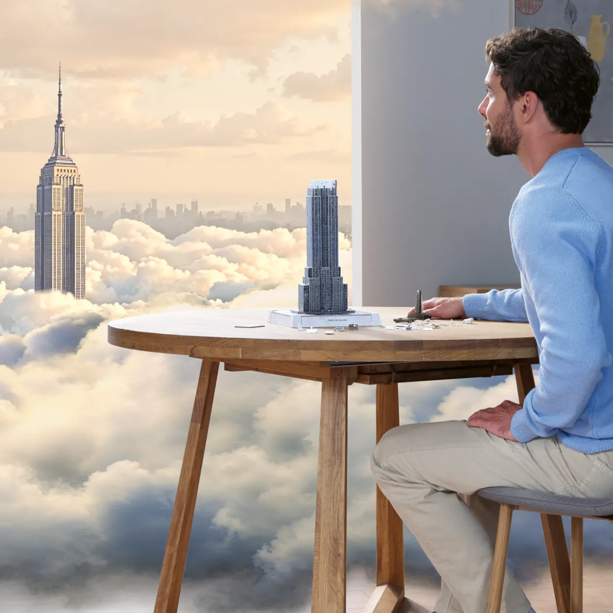 Palapeli Ravensburger 216 palaa Iconics Empire State Building valolla